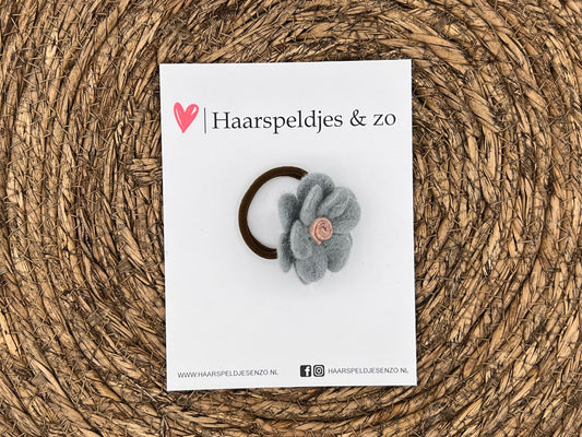 Elastiek - per stuk - hippe kleuren - met bloem - wol - meisjes - blossem - lichtblauw