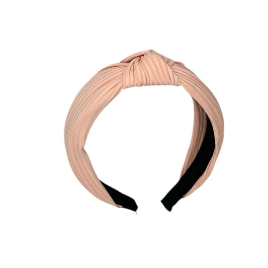 Bandeau en tissu rose saumon avec nœud