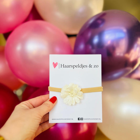 Baby haarbandje - elastiek - met bloem - huidkleurig bandje - crèmekleurige bloem
