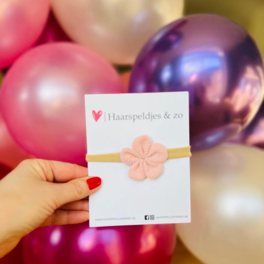 Baby haarbandje - elastiek - met bloem - huidskleur bandje - roze bloem
