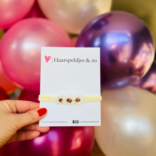 Baby haarbandje - elastiek - met bloemetjes - ivoorkleur bandje - koperkleur madelief