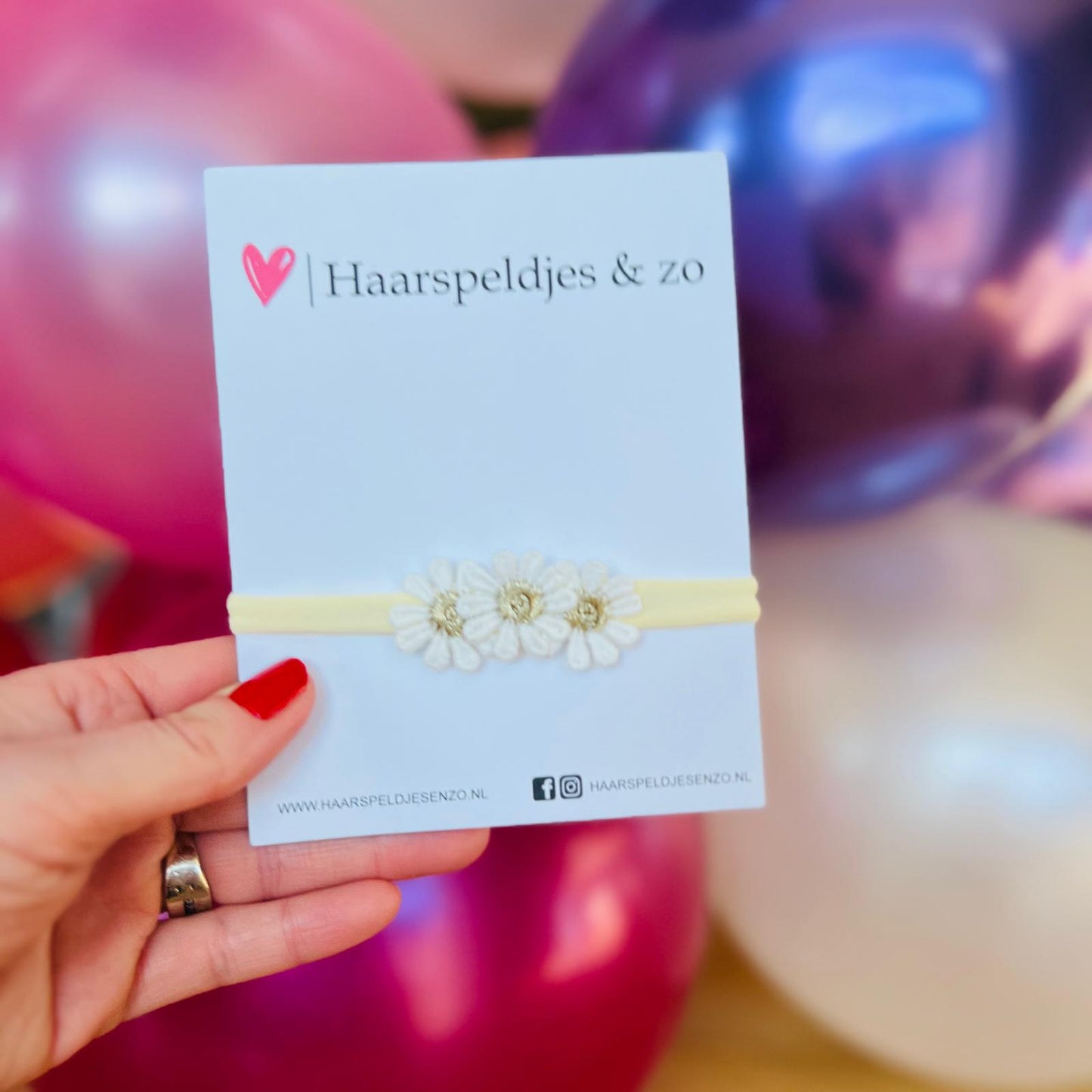Baby haarbandje - elastiek - met bloemetjes - ivoorkleur bandje - gouden madelief
