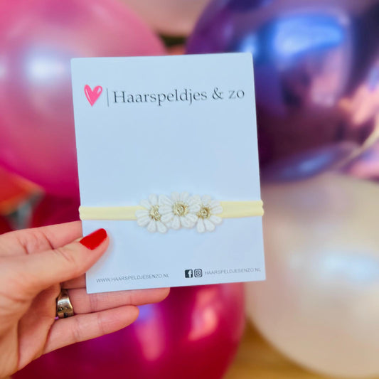 Baby haarbandje - elastiek - met bloemetjes - ivoorkleur bandje - gouden madelief